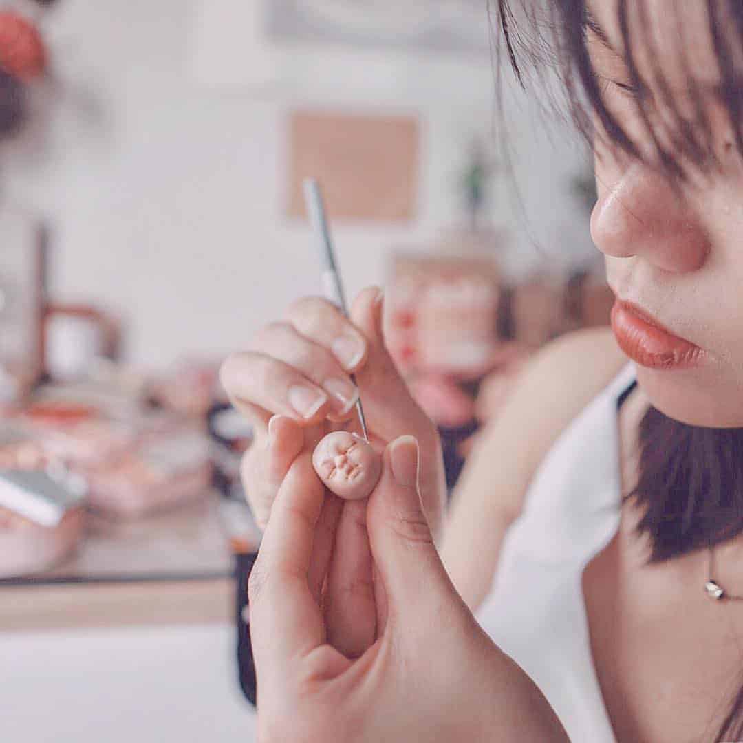 Lim Working on tiny Baby Head