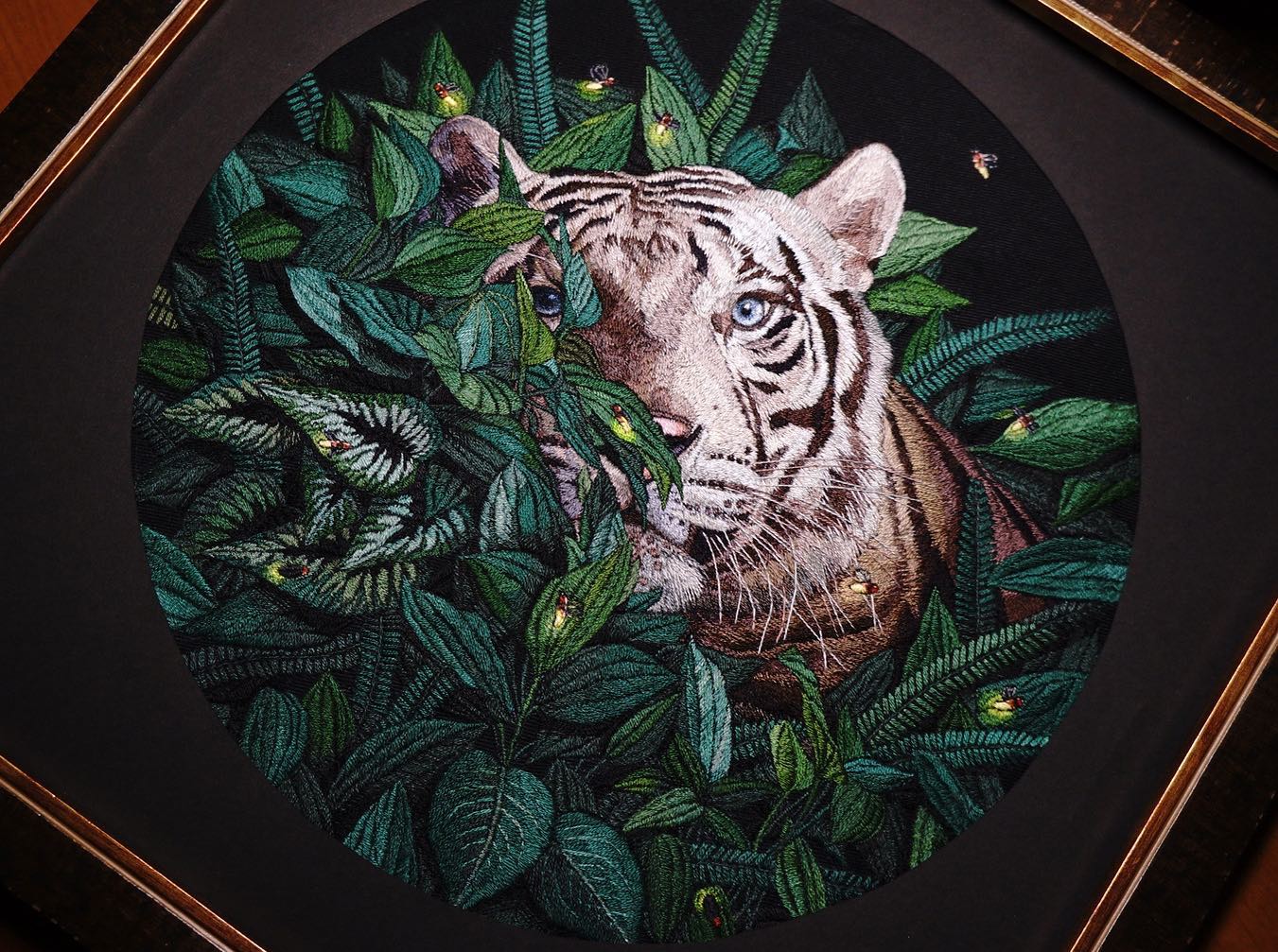 White tiger and fireflies by Kris Machiya